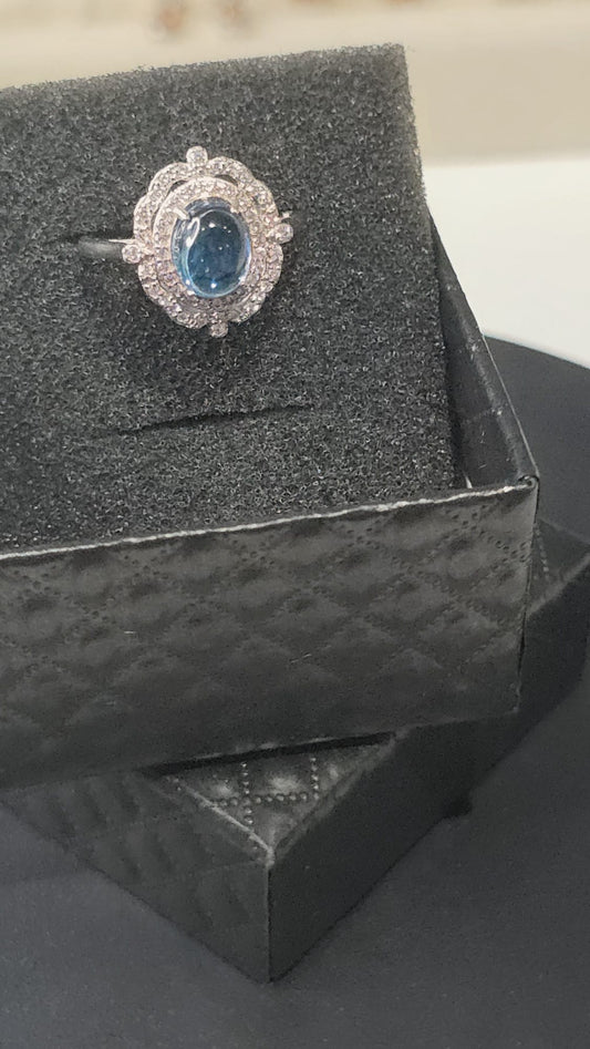 Natural Swiss Topaz Oval Halo Adjustable Ring — Sterling Silver | Kumara Shines